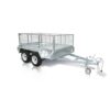 The Premium 10x6 Dual Axle Heavy Duty Tandem Trailer - 3200KG ATM features wire mesh sides, a metal frame, tow hitch, and front wheel for easy maneuverability. The empty trailer is displayed on a white reflective surface.