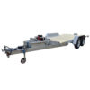 The Hydraulic Tipper Car Trailer offers a metallic frame, dual axles, hitch and wheel for towing, and a 16.4x6.6FT wooden platform designed for vehicle transport. It includes electrical components and storage boxes, with a 3500KG ATM capacity.