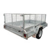 The 9×5 Single Axle Box Trailer ATM 1400KG with Jockey Wheel features mesh sides, a galvanized metal build, white wheel, rear lights, and a flatbed for carrying cargo.