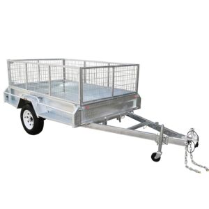 A silver 7x5 single axle utility box trailer with high mesh sides and tow hitch, featuring white wheels and a sturdy metal frame, is designed for transporting goods safely. Equipped with a jockey wheel, this 750KG ATM trailer is angled against a plain white background.