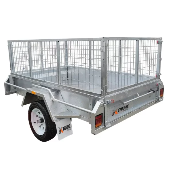 A durable metal 6x4 single axle box trailer with wire mesh sides, silver finish, white wheels, and mudguards. The brand XTREME is displayed on the side and mudguard. It supports ATM 750KG and features a jockey wheel.