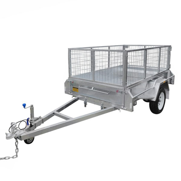 The 7x5 Single Axle Box Trailer ATM 750KG With Jockey Wheel is a silver utility trailer with a mesh cage, tow hitch, two wheels, single axle, and reinforced metal frame for carrying cargo.