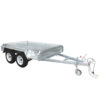 The 7×5 Single Axle Box Trailer ATM 1400KG with Jockey Wheel is a metal utility trailer featuring a flat bed, short side panels, and a robust frame. Equipped with two wheels and a hitch for towing, it is perfect for transporting goods.
