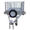 The Premium 10x5 Dual Axle Heavy Duty Tandem Trailer (3200KG ATM) features wire mesh sides, a front-mounted spare tire, tow hitch, safety chains, and a swivel caster wheel for easy maneuvering.