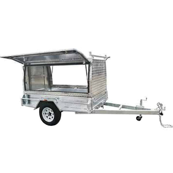 A Premium 8x5 Tradesman Trailer, silver aluminum, features an open side hatch and single axle. Its designed for towing with a long tongue, hitch at the front, and chain mechanisms for secure attachment. The trailer supports 1400KG ATM.