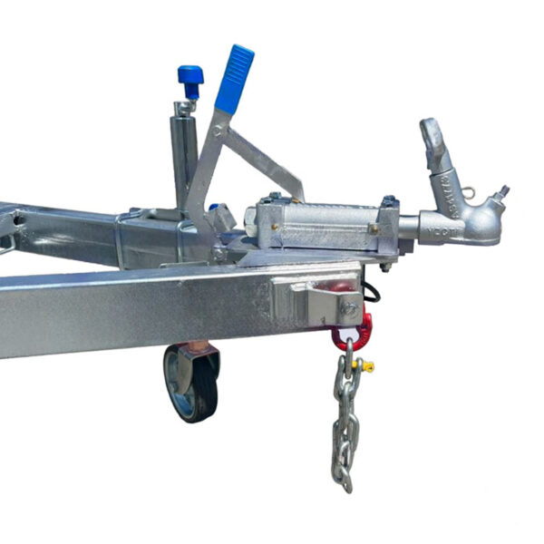 Close-up of the metallic trailer hitch on the Premium 8x5 Single Axle Tradesman Trailer with a blue lever, wheel, chain, and partially visible coupling mechanism on a white background.