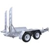A silver dual-axle car trailer with two ramps at the rear, designed for transporting vehicles. It has white wheels and a metal surface with a grid pattern for traction. The front features a hitch for towing.