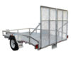 The 10x7 Heavy-Duty Trailer, perfect for ATVs, zero turn mowers, golf carts, and buggies with a 1400KG capacity, is silver with a white single axle wheel and fender. It features a metal mesh ramp at the rear and a coupling hitch at the front.