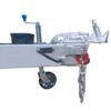 The Premium 10x7 Galvanized Flat Top Trailer with 3500KGS ATM and Ramps features a close-up of a coupling mechanism, safety chain, support wheel, blue handle, and electrical connector for vehicle attachment.