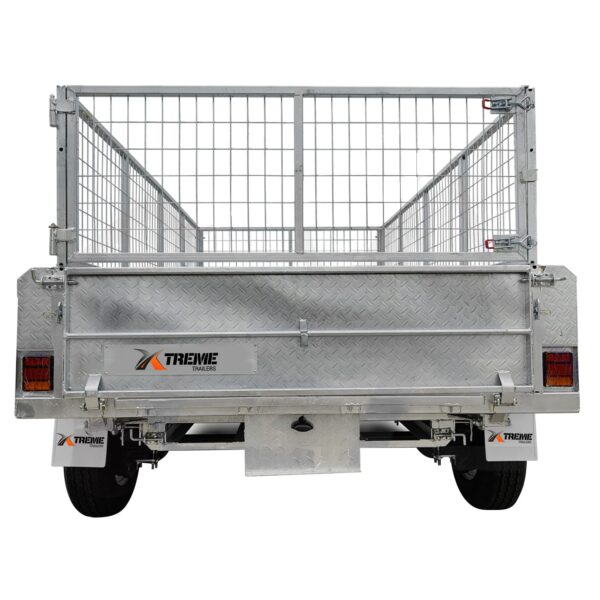The image displays the rear view of a 10×5 Dual Axle Hydraulic Tipper Tandem Box Trailer, featuring a mesh cage frame, tail lights, mud flaps with the Xtreme Trailers logo, and two wheels. Its designed for carrying up to 3500KG of goods with ramp holders.