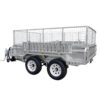 The 10×6 Dual Axle Hydraulic Tipper Tandem Box Trailer - 3500KG ATM With Ramp Holders features high mesh sides, a silver metal frame, white wheels, and is designed for transporting goods. It's shown against a plain white background.