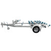 The metallic Twin Jetski Roller Trailer – ATM 1400kg features multiple blue rollers for transporting two watercraft. It includes a single set of wheels and a hitch, with no jetski included to showcase its frame and roller arrangement clearly.
