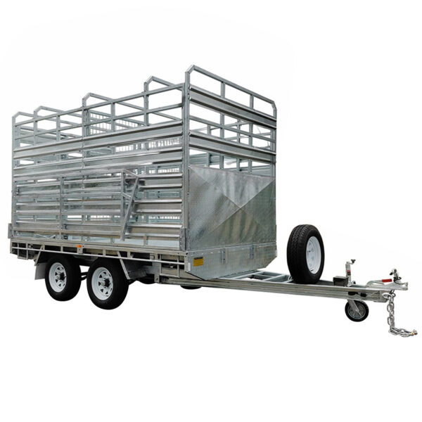 Side view of the 12x7 Dual Axle Flat Top Cattle/Livestock Trailer (3500KG ATM) featuring high side rails, dual wheels, spare tire on the drawbar, triangular front, and visible hitch against a white background.