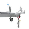 Close-up view of an 8x5 Hydraulic Tipper Single Axle Box Trailer showing a blue-handled hand crank, a red hook-attached chain, and two wheels. Emphasizes the coupling mechanism and support structure.