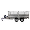 The 14x7 Dual Axle Hydraulic Tipper Tandem Box Trailer - 4500KG ATM With Ramps features mesh side panels, a spare tire at the front, a tow hitch, and dual wheels on each side, making it ideal for hauling heavy cargo.