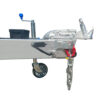 Close-up side view of a 14x7 Dual Axle Hydraulic Tipper Tandem Box Trailer (4500KG ATM With Ramps) showing its metal trailer hitch, hand crank, caster wheel, safety chains, and black battery box attached to the frame.