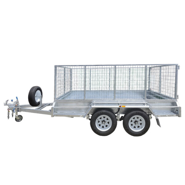 The Premium 8x5 Dual Axle Heavy Duty Tandem Trailer (2000KG ATM) for sale features 425mm high mesh sides, four tires, a mounted spare wheel, and a tow hitch—ideal for transporting goods or equipment.