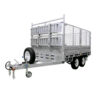 A Premium 10x7 Galvanized Flat Top Trailer with 4500KGS ATM, featuring double axles, metal mesh sides, a front gate, a side-mounted spare tire, and a tow hitch at the front, is shown on a white background.