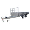 A Premium 10x7 Galvanized Flat Top Trailer with 4500KGS ATM, finished in silver, featuring a dual-axle design, sturdy metal frame, side rails, a front gate, hitch, and a front support wheel.