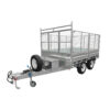 A Premium 12×7 Hydraulic 3-Way Tipper Galvanised Flat Top Trailer (4500kg ATM, available for pre-order), featuring a dual-axle design, silver galvanized finish, metal mesh sides, a front-mounted spare tire, and a small toolbox positioned near the hitch.