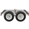 Side view of the Premium Hydraulic Tipper Car Trailer 4200kg ATM 16.4×6.6FT (5x2M) Deck Size (Pre-order), constructed from metal with a silver finish and equipped with two black rubber tires featuring white rims. The trailer is positioned against a white background, showcasing red and yellow reflectors above the wheels.