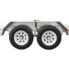 Side view of the Premium Hydraulic Tipper Car Trailer 4200kg ATM 16.4x6.6FT (5x2M) Deck Size - Punched Floor, featuring a dual axle with two black tires on white rims mounted to a sturdy metal frame, and equipped with both a red reflector and a yellow reflector above the wheels.