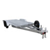A Premium Dual Axle Car Trailer 4200kg ATM with a 16.4×6.6FT (5x2M) punched floor deck is shown in silver, featuring rear dual axles and a sturdy metal towing hitch at the front, viewed from an angled front right perspective against a white background.